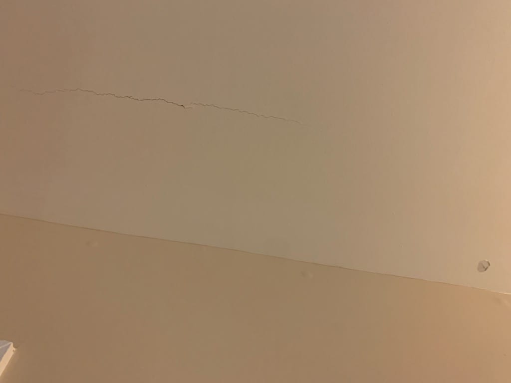 Drywall before repair