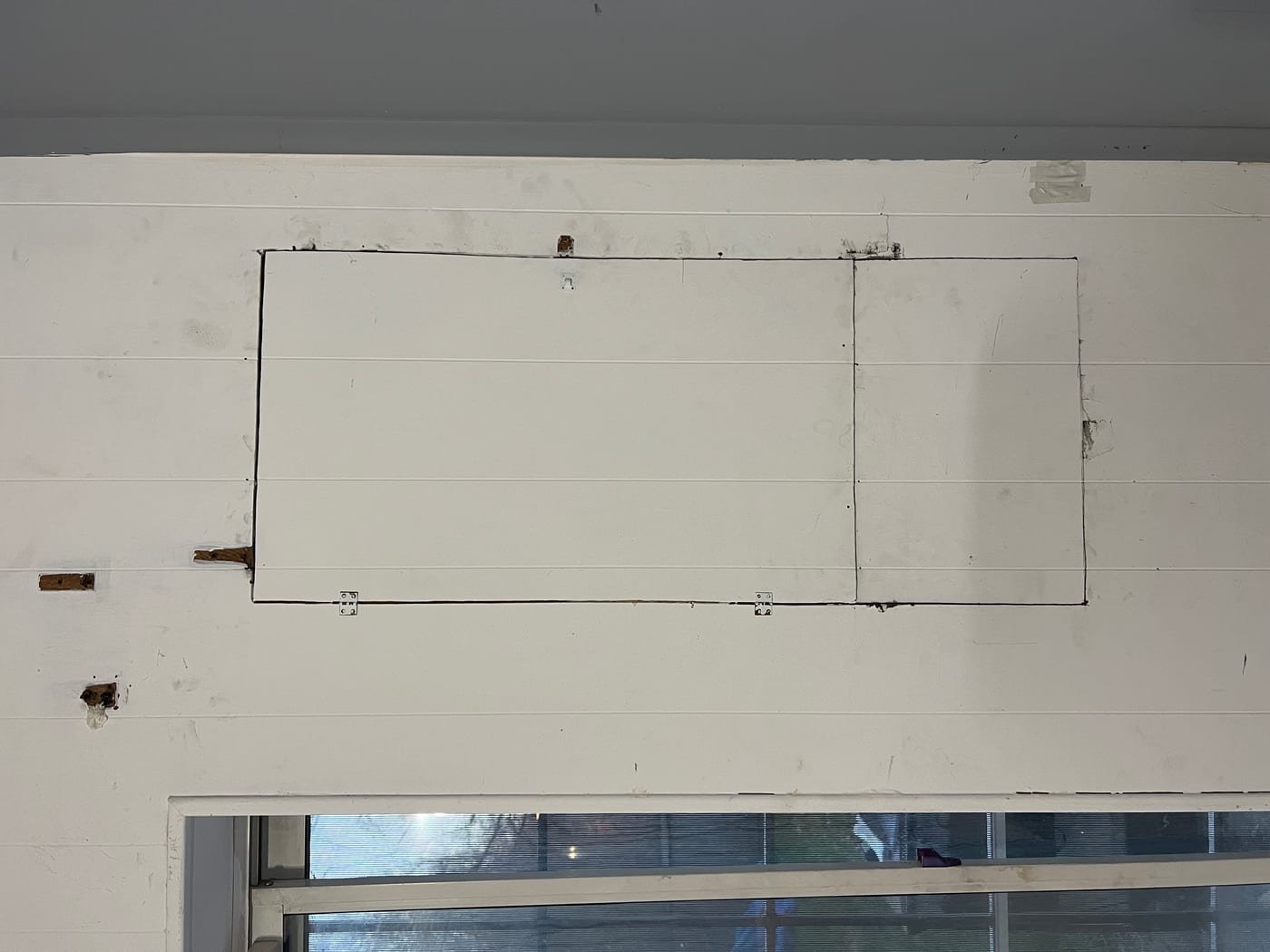 Drywall before repair