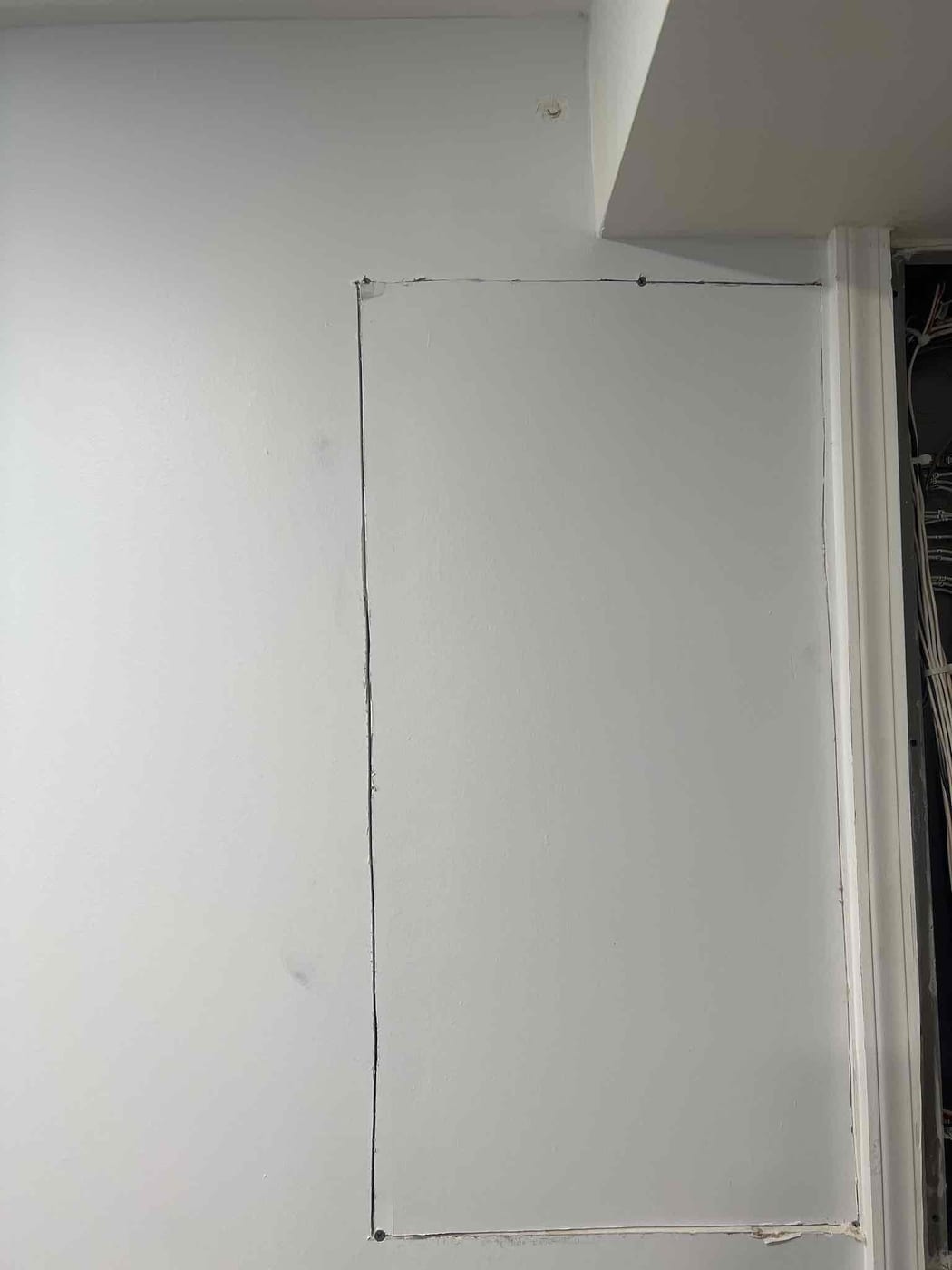 Drywall before repair