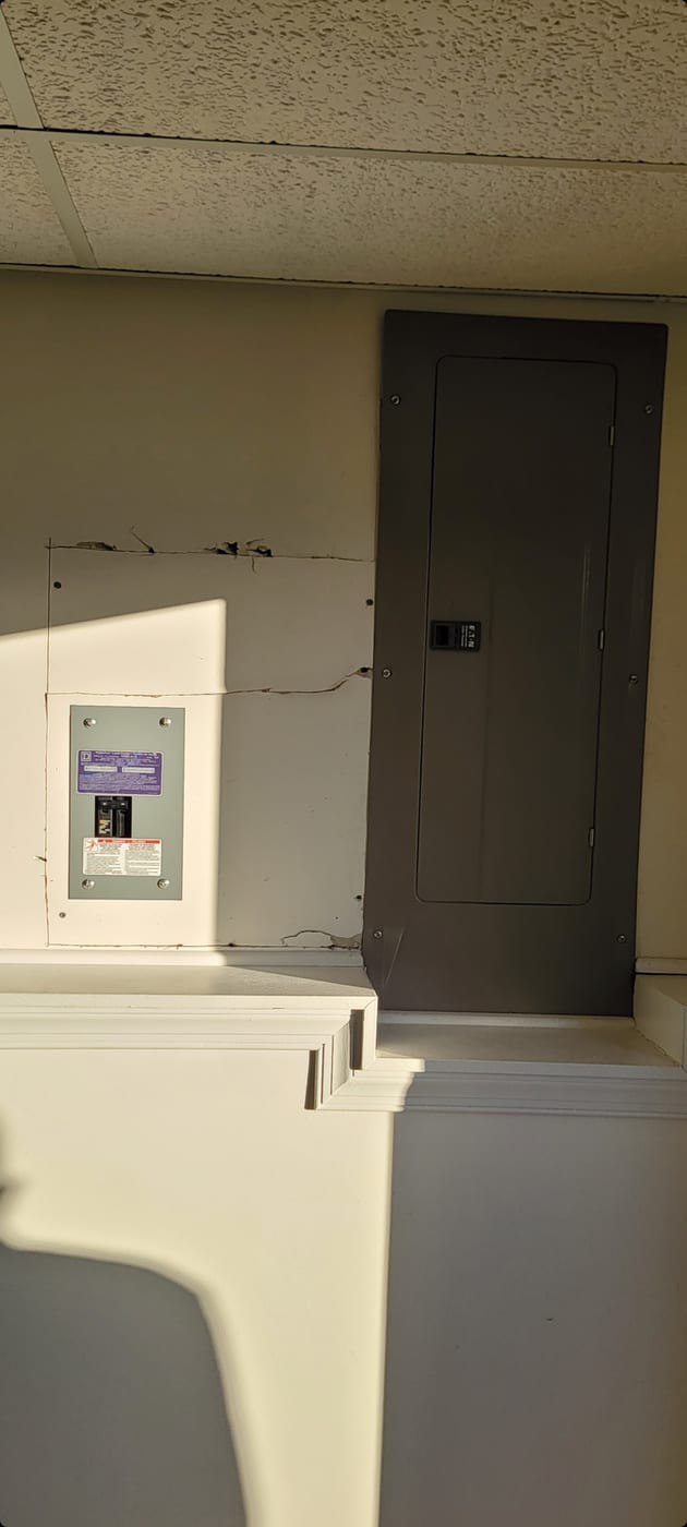 Drywall before repair