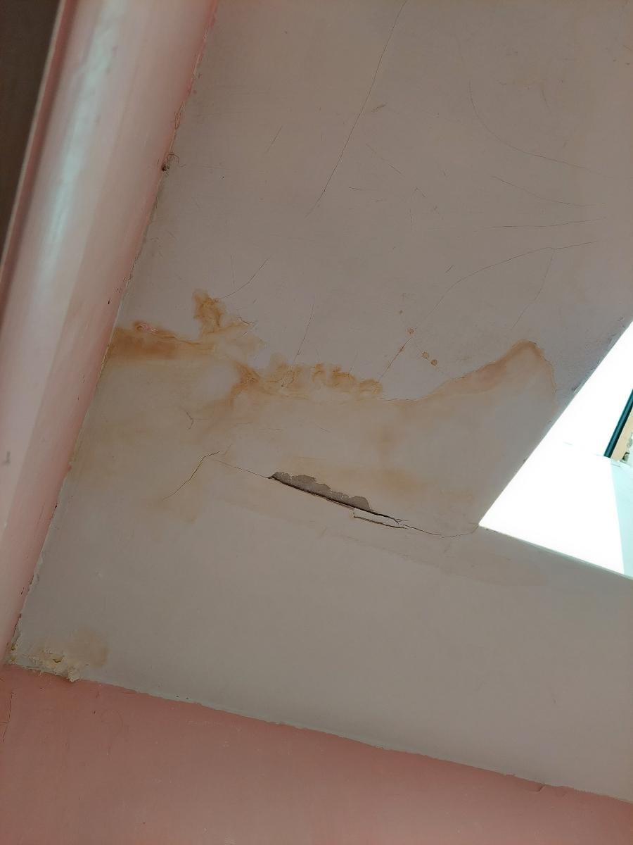 Drywall before repair