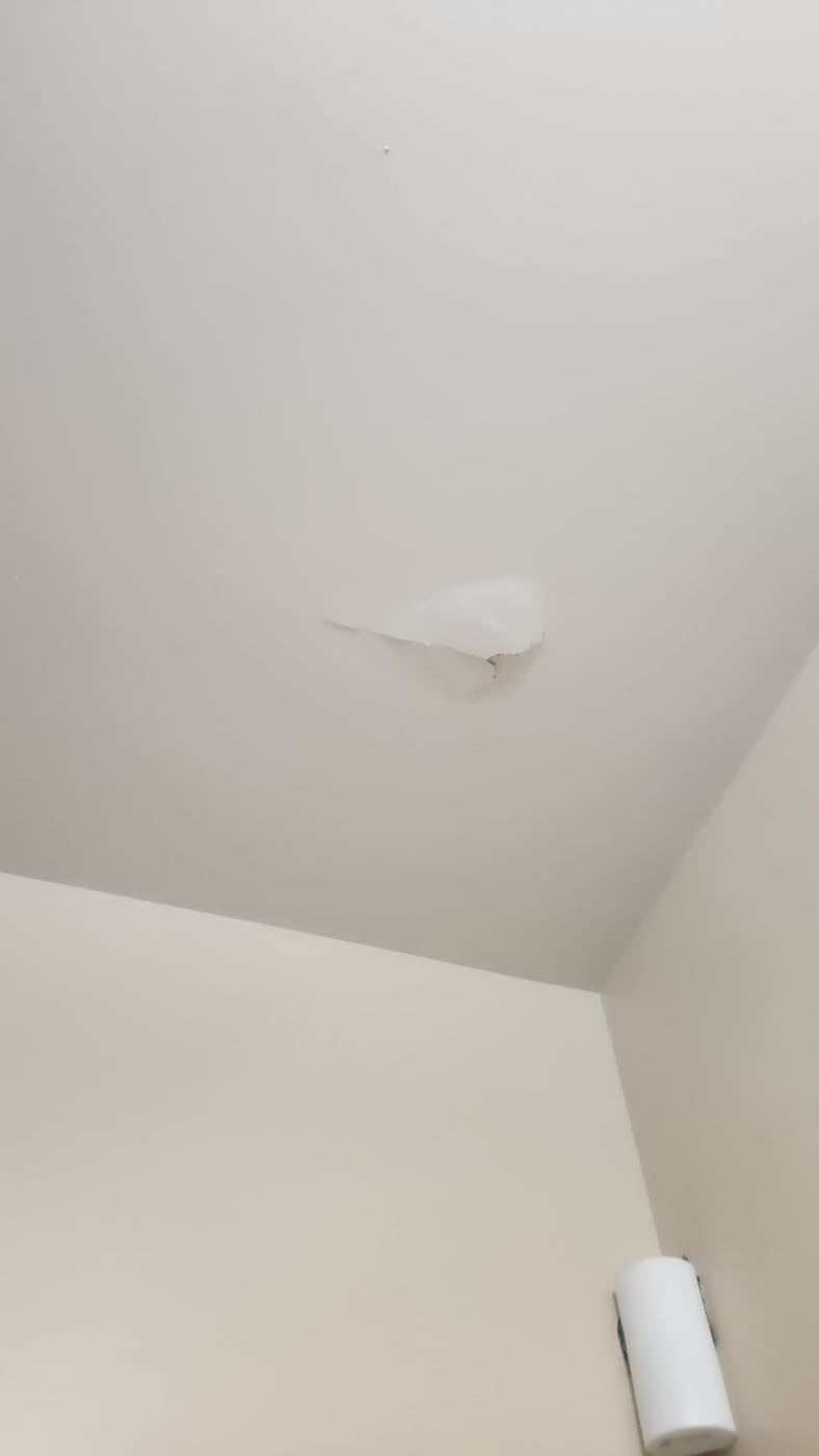 Drywall before repair